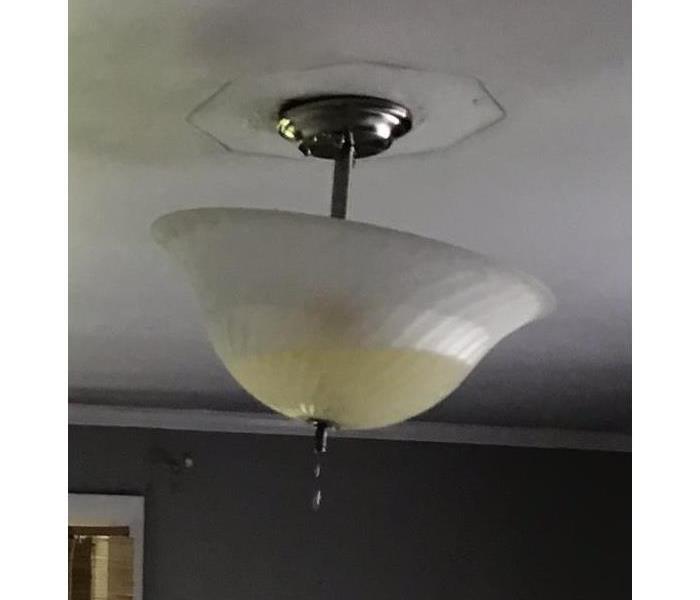 Water Damage to Ceiling Lamp